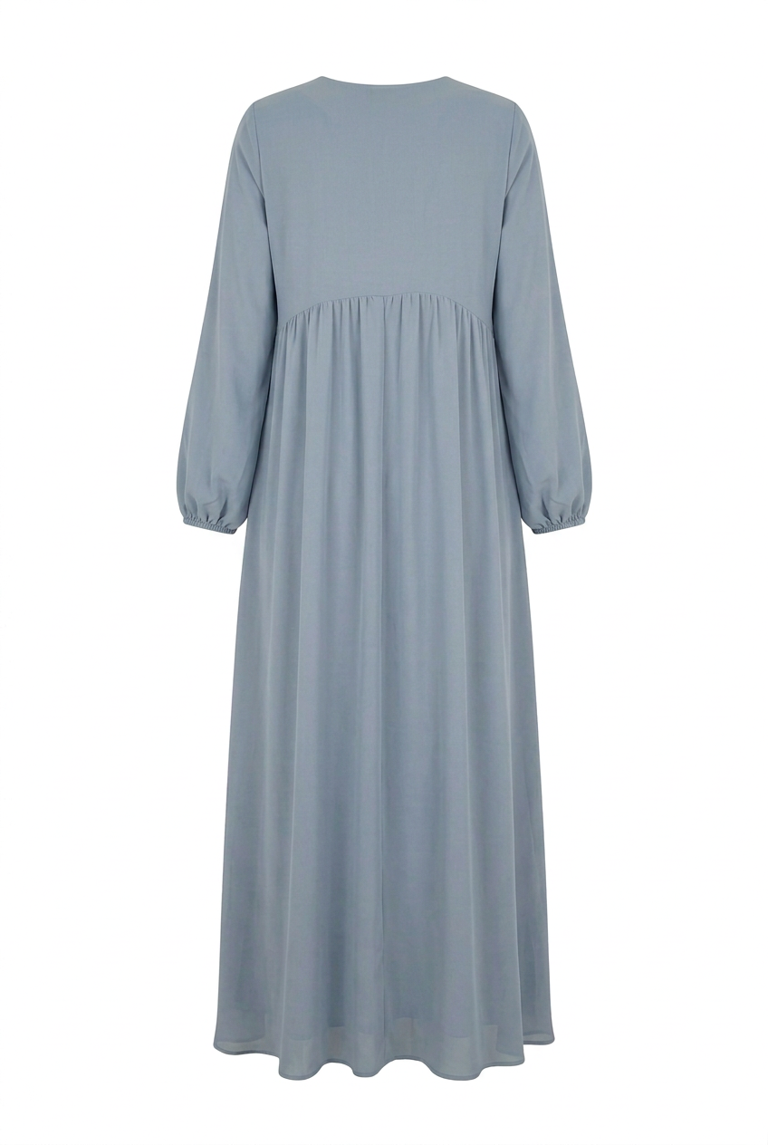 'Amara' Maxi Smock Dress in dusty blue chiffon, back view showing gathered pleating, on a white background
